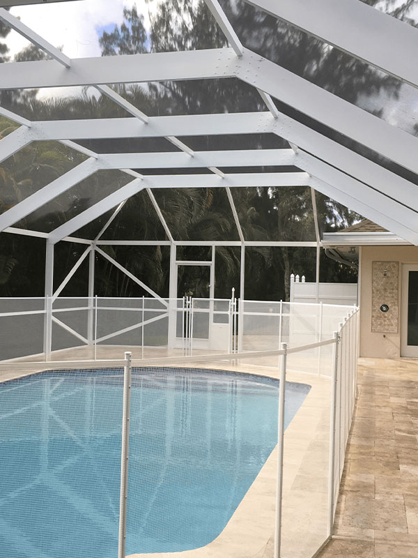 White patio roof with pool screen enclosure