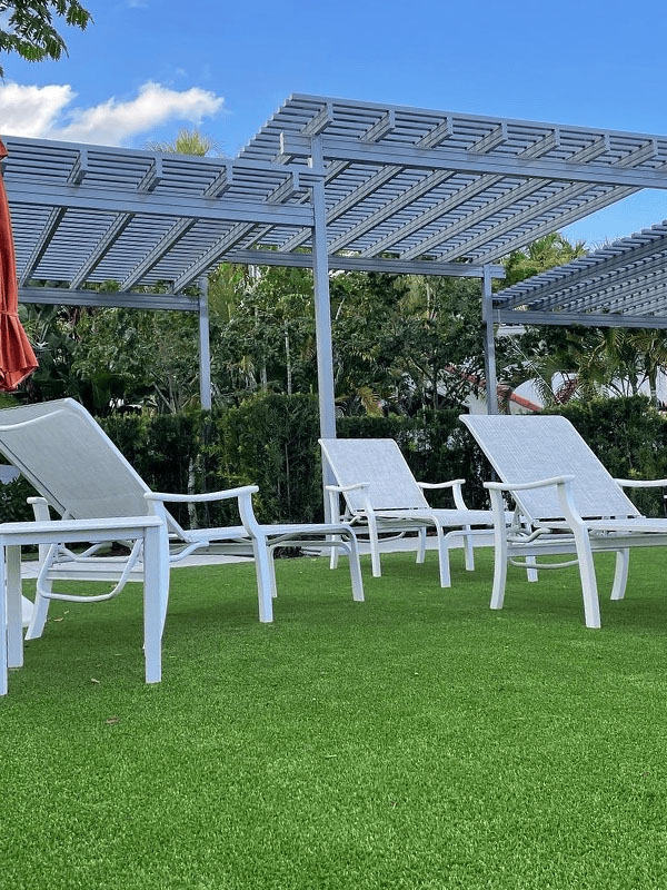 White pergola in backyard