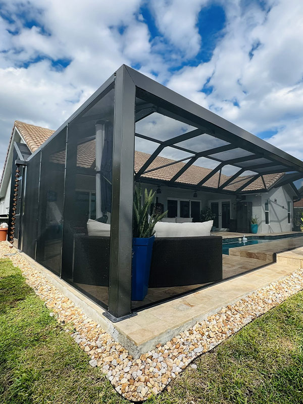 Black pool enclosure in backyard